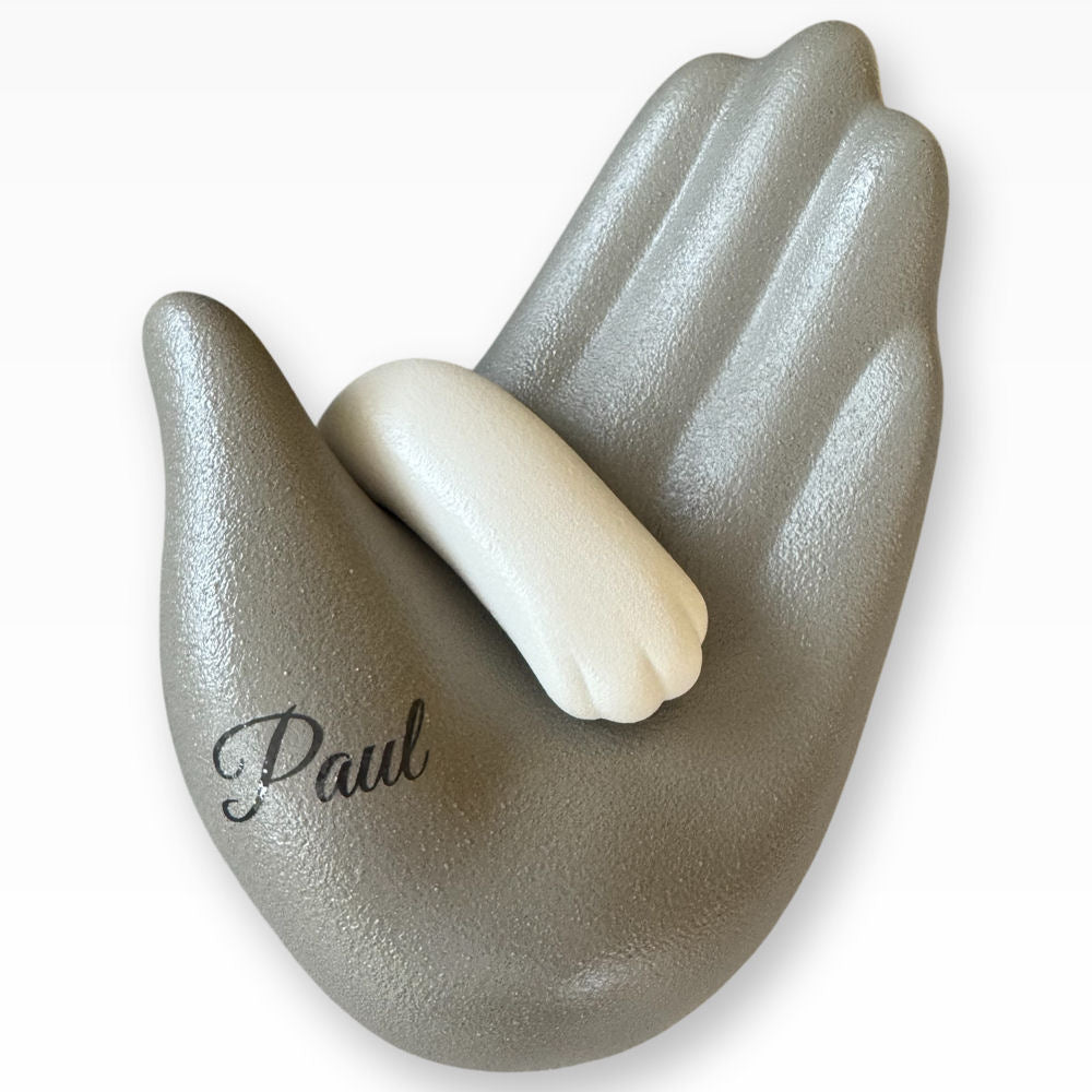 Tierurne Vertrautheit Pfote in Hand